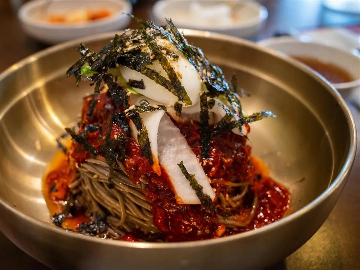 Sweet and spicy Korean cold pasta bibim guksu